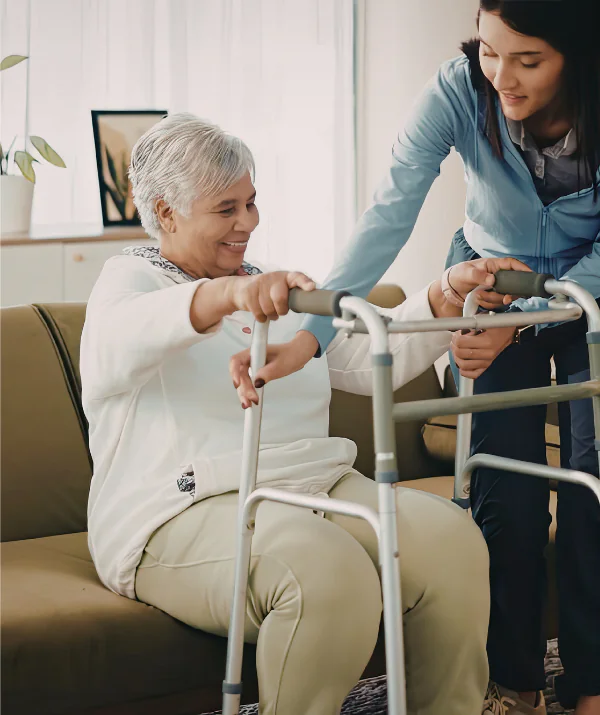 Woman using walker to stand up